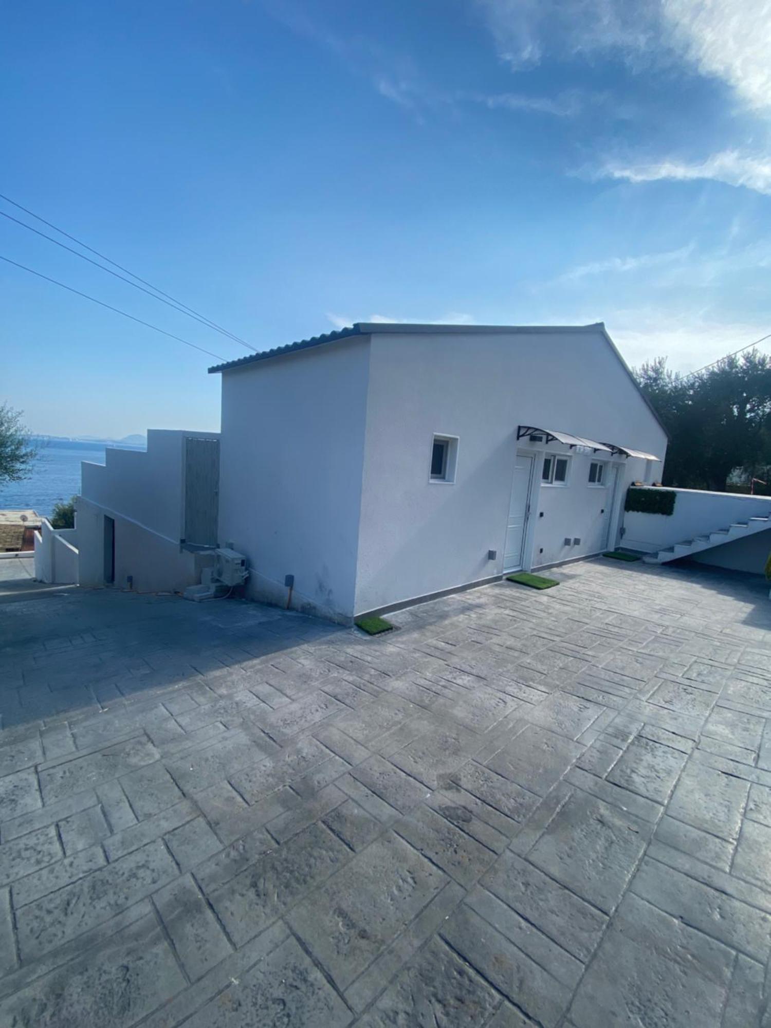 Akrogiali Apartments Barbati Bagian luar foto